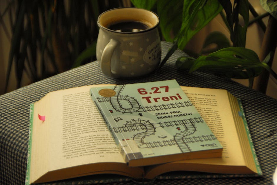 A book titled 6.27 Treni and a cup of coffee